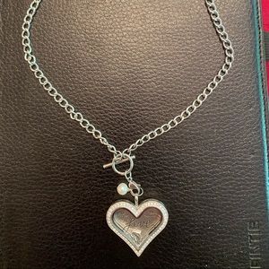 Origami owl necklace in silver with charms